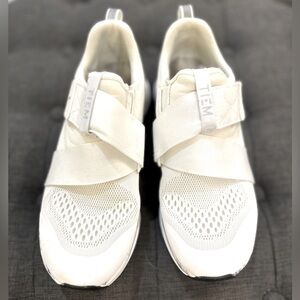 White TIEM cycle shoes.
